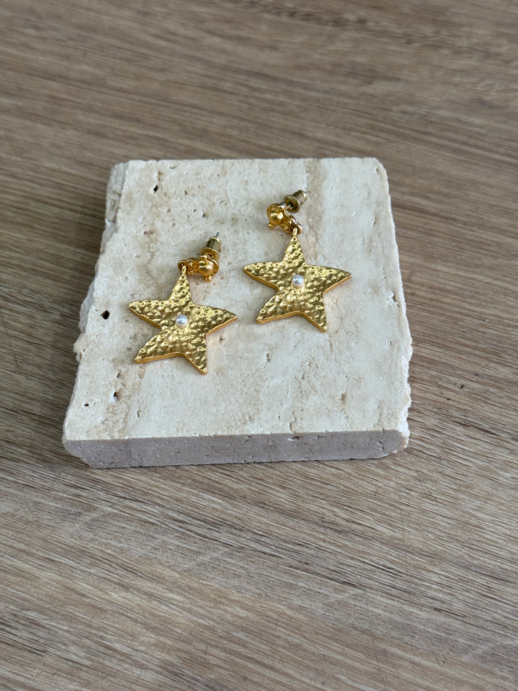 HAMMERED STAR DROP STUDS